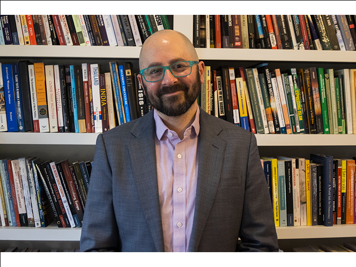 Photo of Boston University Professor Jeremy Menchik in his office.