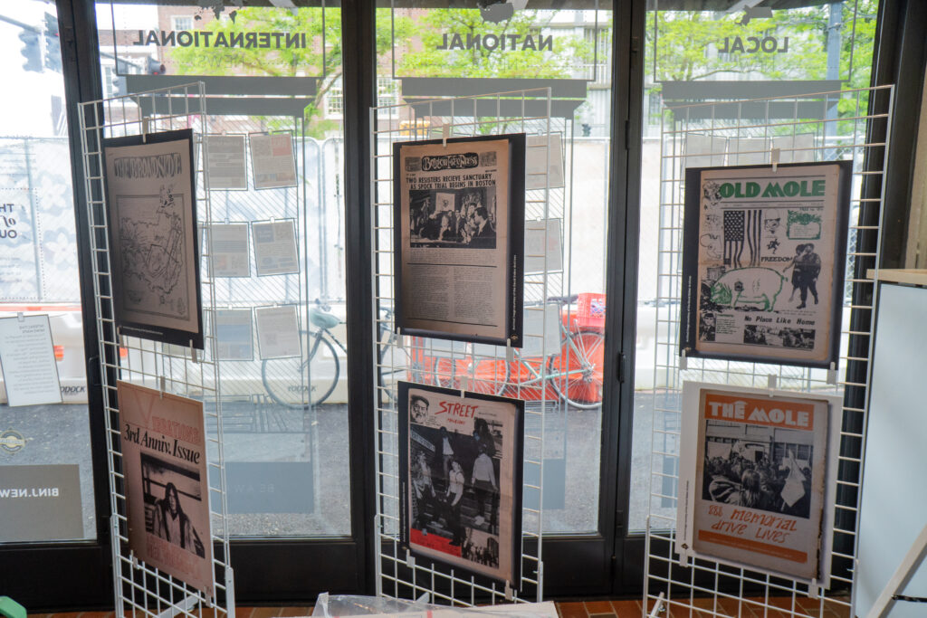 Cambridge-based underground newspapers from the 1960s to the 1980s at BINJ's 2025 Cambridge Kiosk exhibit. Copy of Street Magazine can be seen in the middle of the bottom row. Photo by Jason Pramas. Copyright 2025.