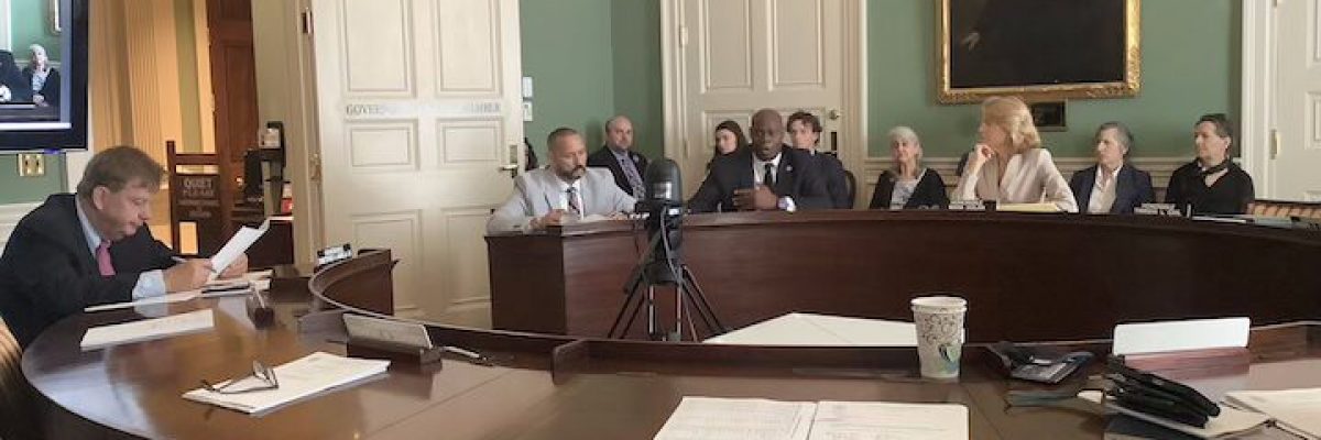 Pictured: Members of the Governor’s Council listen to Probation Commissioner Pamerson Ifill testify for Angelo Gomez in June | Photo by Jean Trounstine