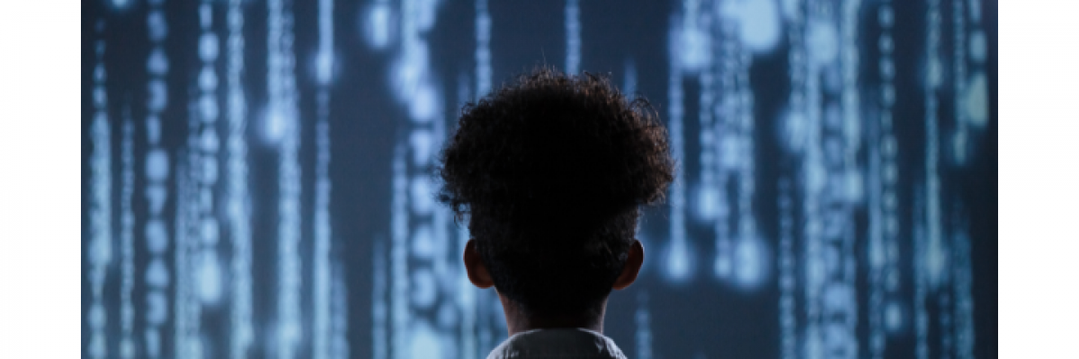 Image of a young person facing a waterfall-like representation of a digital future