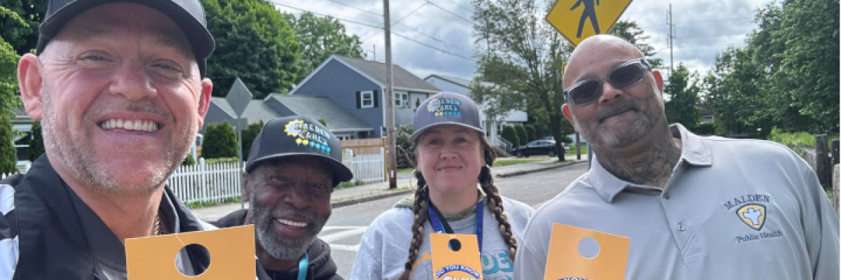 (Left to Right): Paul Hammersley, founder of Malden Cares, recovery coaches Kenny Gumes, Sandra Wood and PJ Bell. The Malden Cares recovery coaches go around Malden, knocking on doors to provide residents with addiction recovery resources. Photo courtesy of Malden Cares/Paul Hammersley.